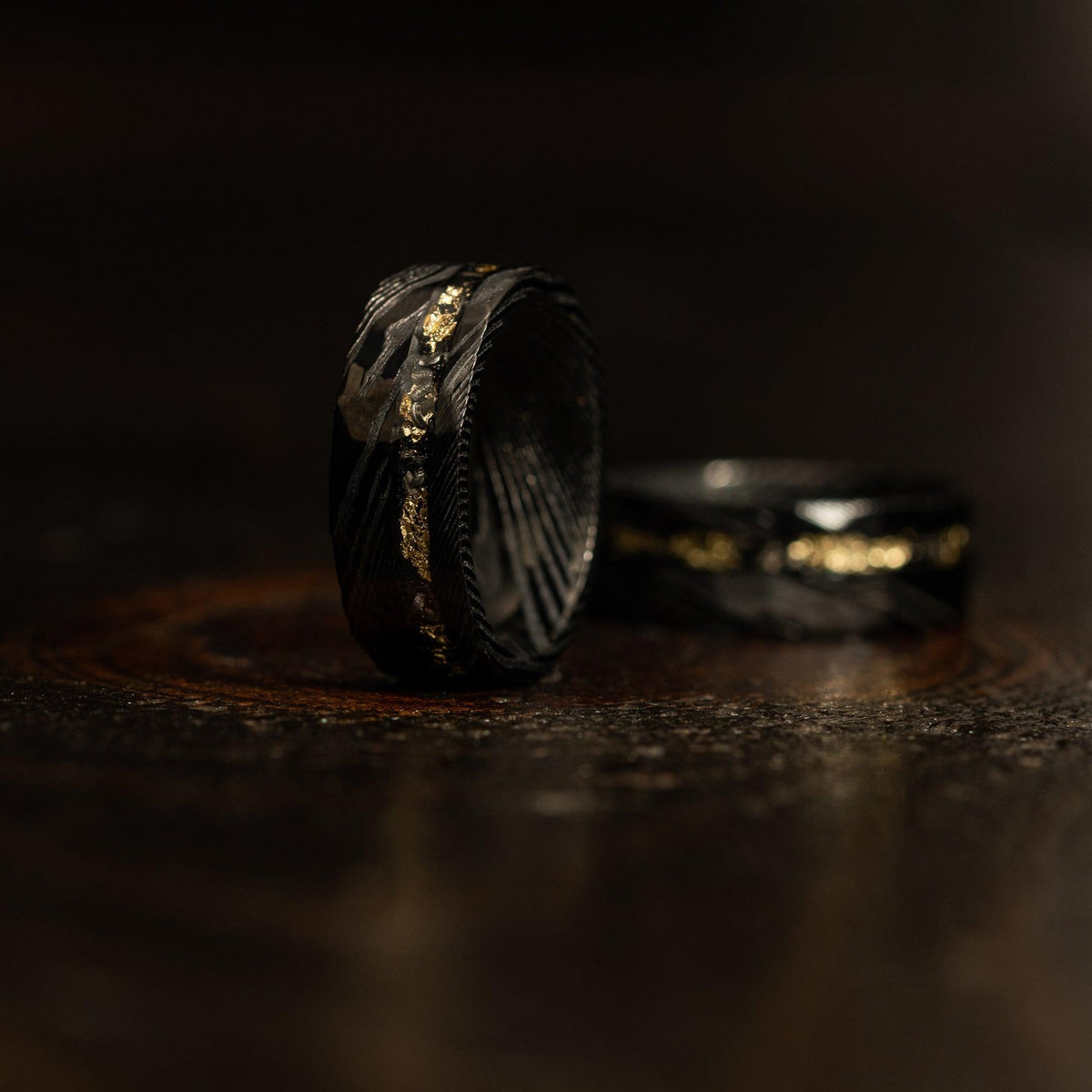 Black Hammered Flat &quot;Poseidon&quot; Meteorite/Gold Leaf Inlay- Steel Ring